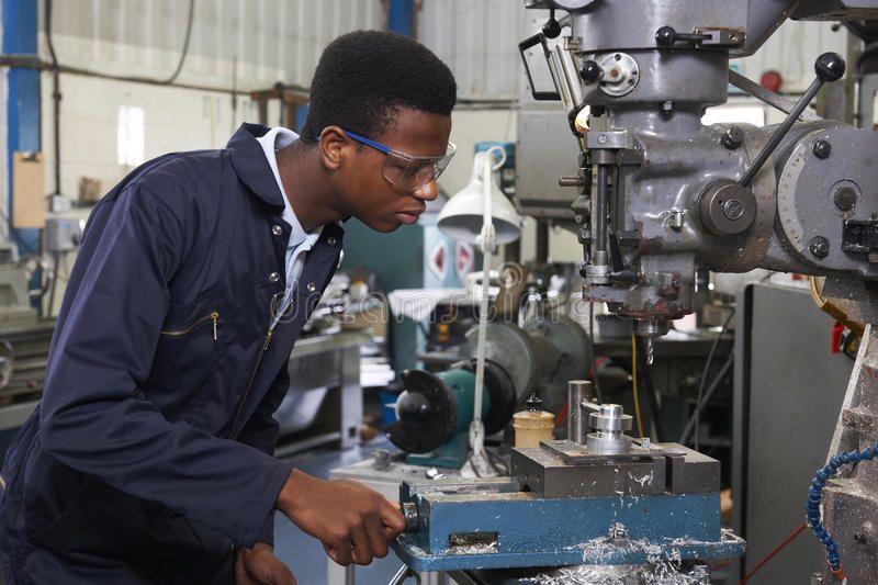 Male Apprentice Engineer Working On Drill In Factory Apprentice Engineer Workin spon Engineer Apprentice Male Factory Drill ad by burninhell
