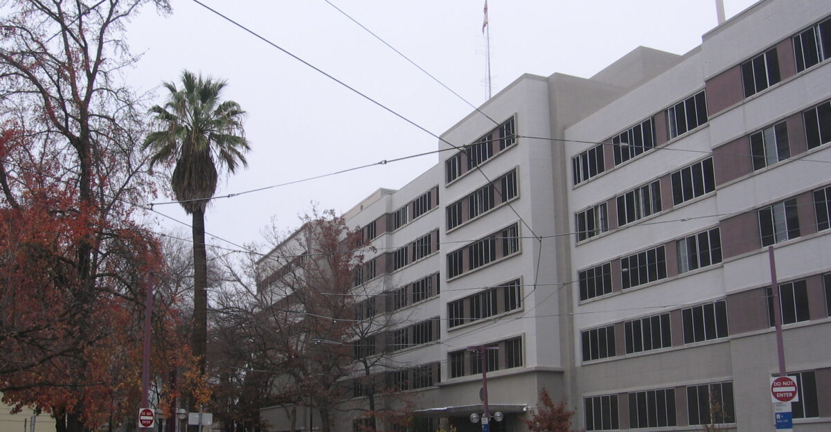 The headquarters of Caltrans District 3 on O Street in Sacramento California USA The Archives Plaza light rail station lies at the far end of the building at 11th Street in this view looking westnorthwest along O Street from 12th Street