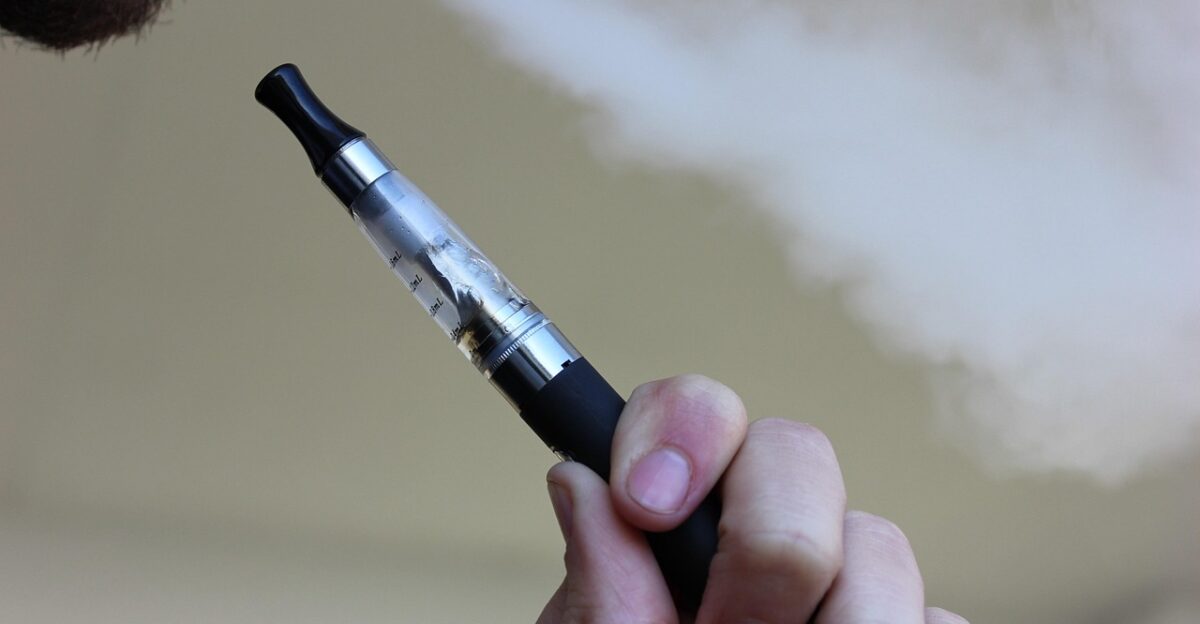 e cigarette vaping electronic cigarette vaporizer vape pen vape vapor cigarette tobacco smoke man model smoking quit smoking lung cancer ash cancer nicotine fire white addictive addiction health gray health gray fire gray model gray smoke gray cancer