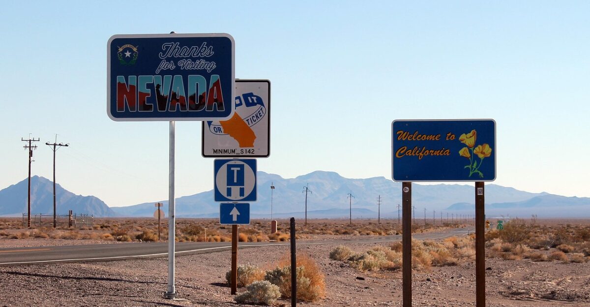 nevada california border road sign welcome amargosa valley blue welcome blue border