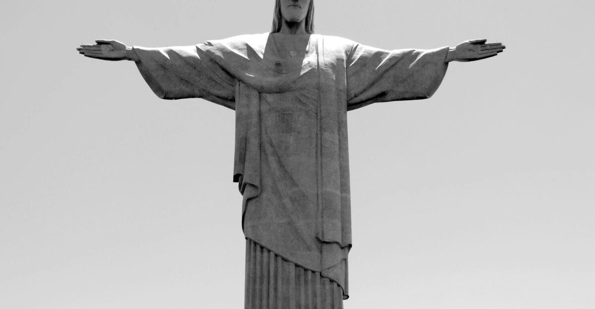 Black and white photo of the iconic Christ the Redeemer statue in Rio de Janeiro Brazil
