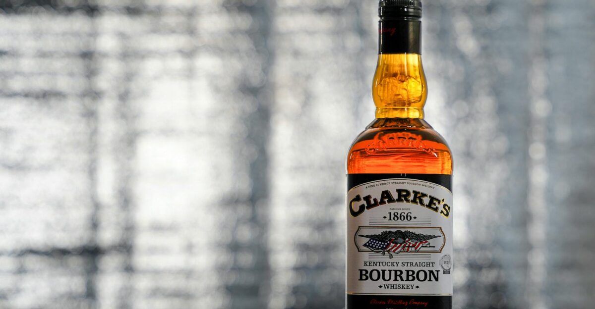 Close-up of Clarke s bourbon whiskey bottle with reflective background