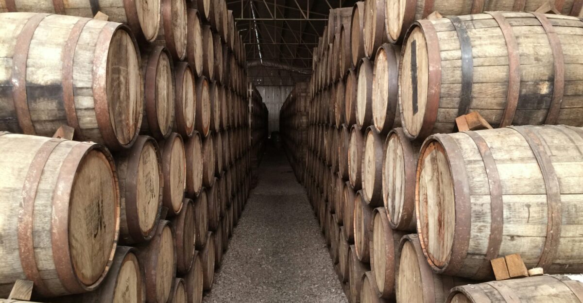 pile brown barrels inside building