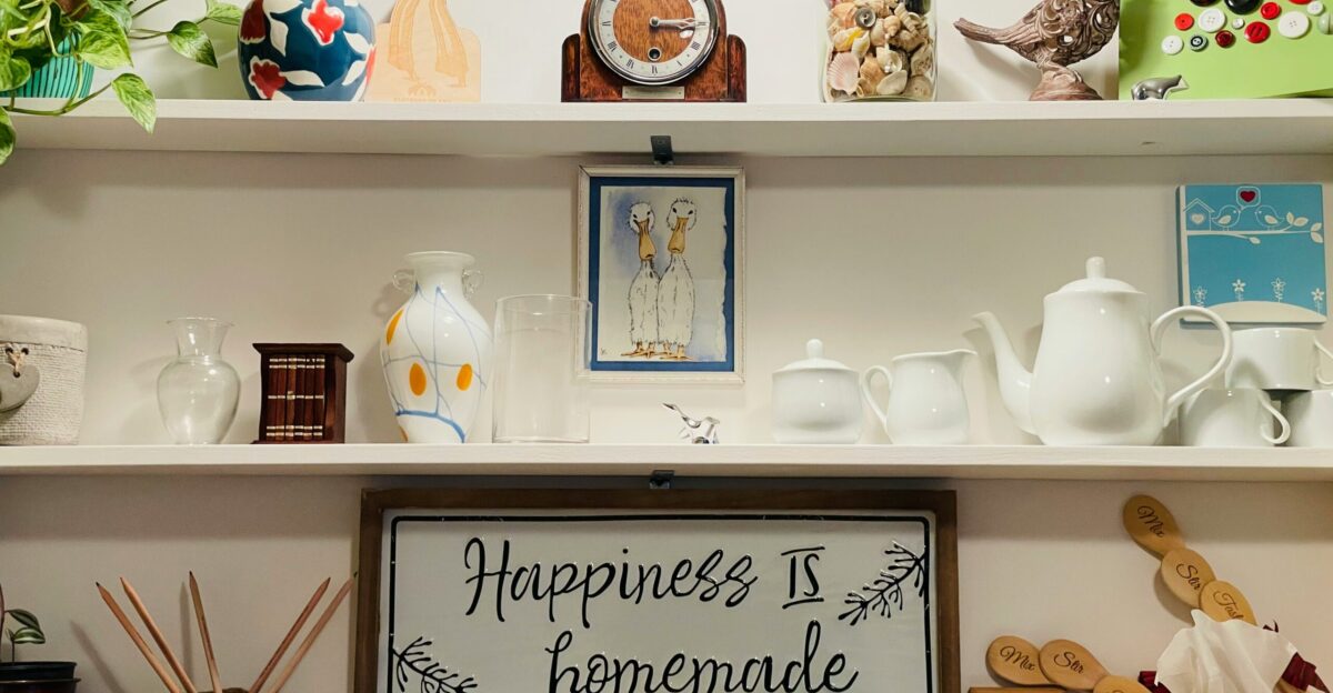 white ceramic teapot on white wooden shelf