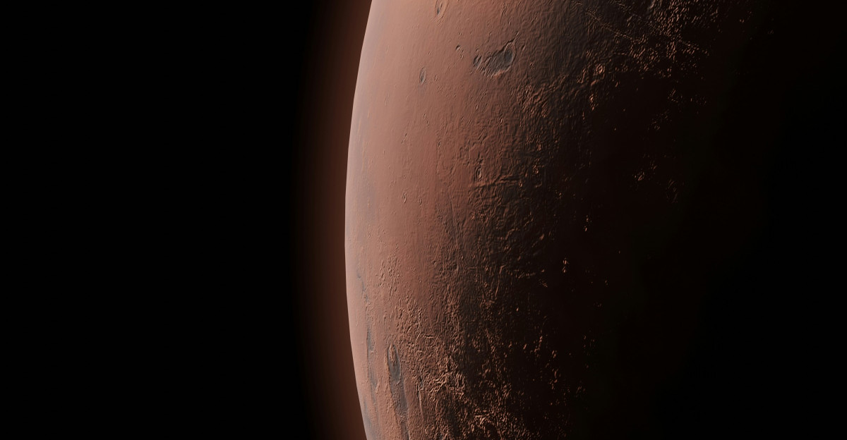 a red planet with a moon in the background