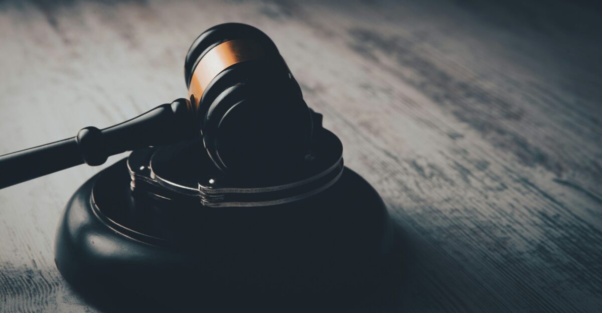 a judge s gaven on a wooden table