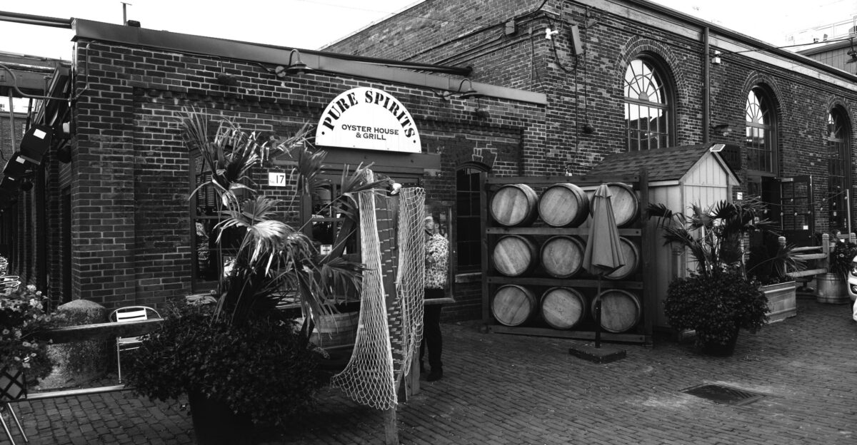 a black and white photo of a brick building