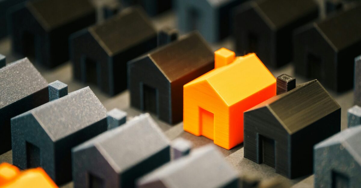 A single bright house stands out from the rest