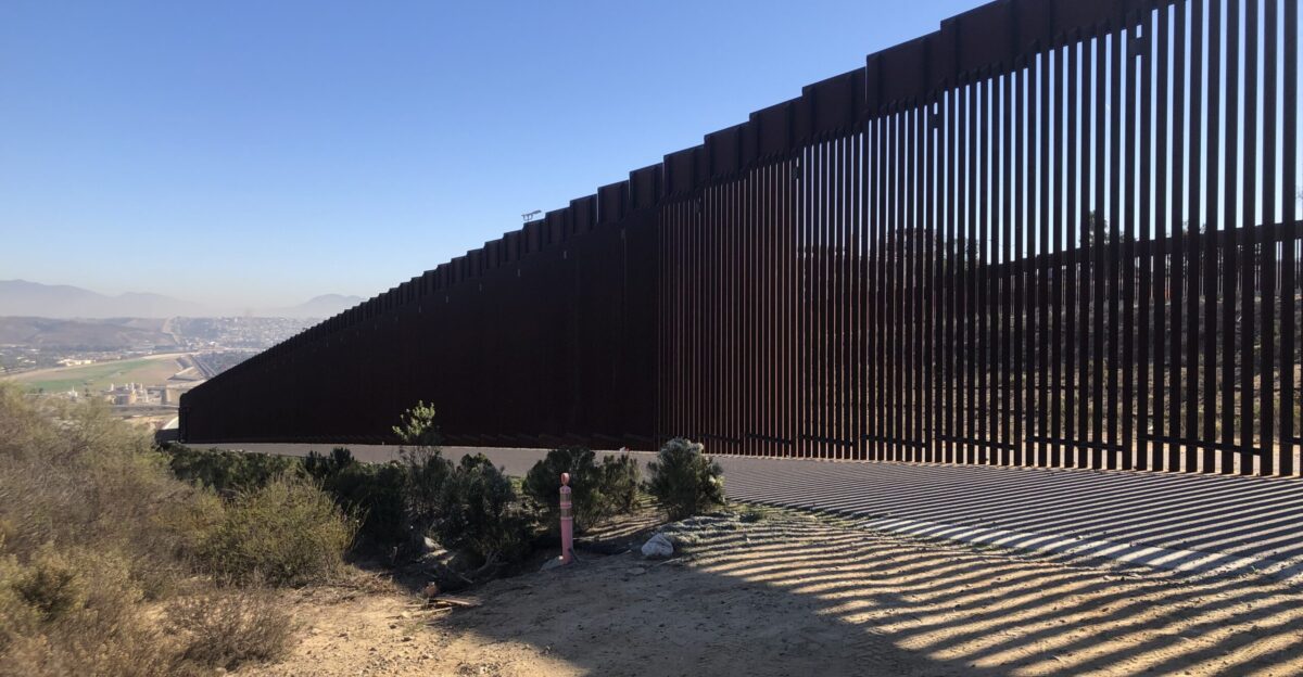This is the wall at the U S - Mexico Border in San Diego The shadow is casted on the U S territory