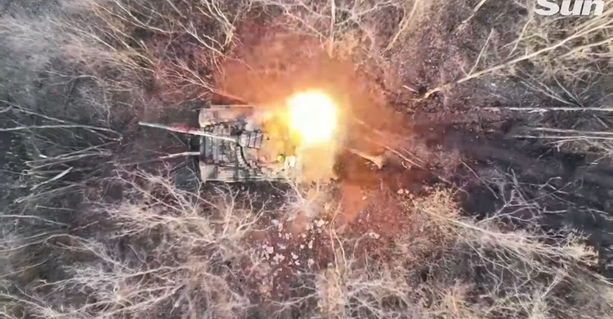 Russian tanks explode as Ukrainian drones drop bombs into open hatches by GB Videos