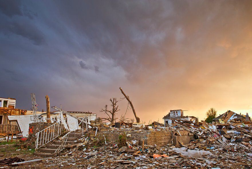 Tornado Aftermath at Sunset Joplin Missouri 2011 A Joplin Missouri neighborhood lies in ruins three weeks after an extremely destructive EF-5 tornado struck the community on May 22 2011 killing 160 people The mile wide twister was part of a late-May tornado outbreak The storm resulted in 2 2 billion in damages making it the largest insurance payout in Missouri history Jim Reed by Polly Naviaux