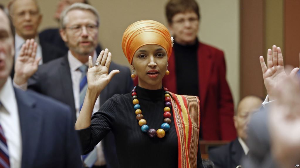 State Rep Ilhan Omar takes the oath of office as the 2017 Legislature convened Tuesday Jan 3 2017 in St Paul Minn by Art For The Wall by Winston Home Office
