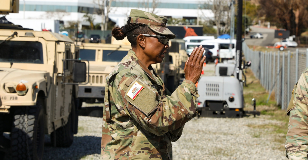 California National Guard Soldiers from the 143rd Military Police Battalion and the California State Guard from the 143rd Military Police Support Detachment collaborate to establish a new area of operation in Malibu near the Palisades fire area Calif on Feb 11 2025 This collaborative effort aims to build a mobile facility for troops supporting ongoing wildfire response efforts in Los Angeles U S Army National Guard Photo by Sgt Chau Le