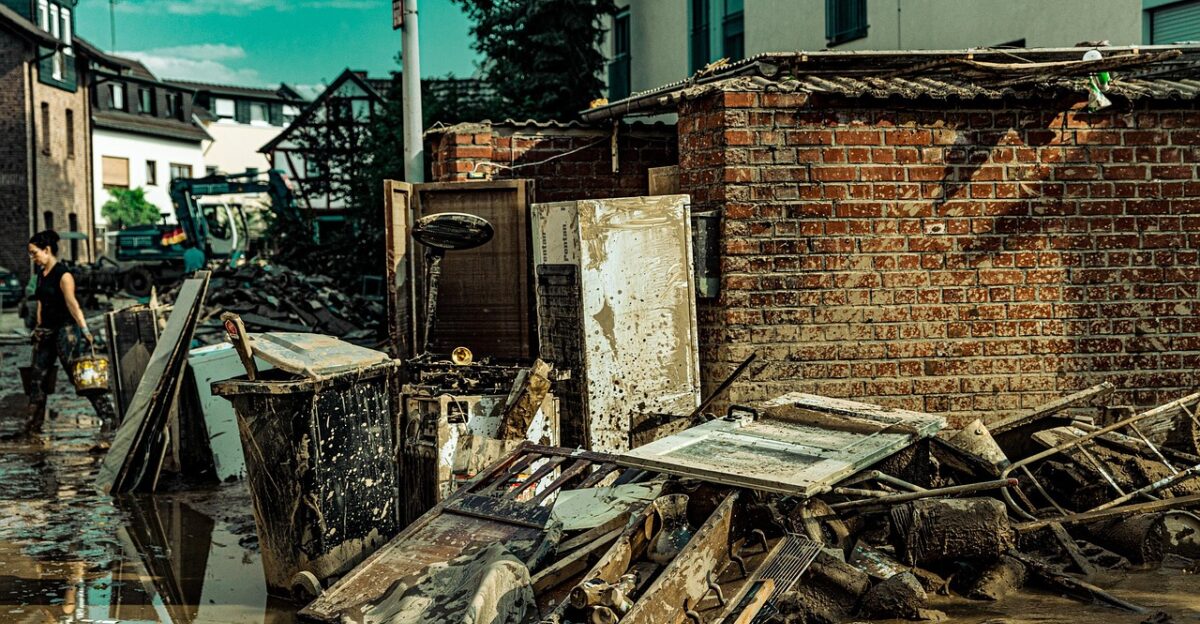 flood mud building tractor dirt road historic center old building city nature flood disaster flooding civil protection water flood of the century precipitation