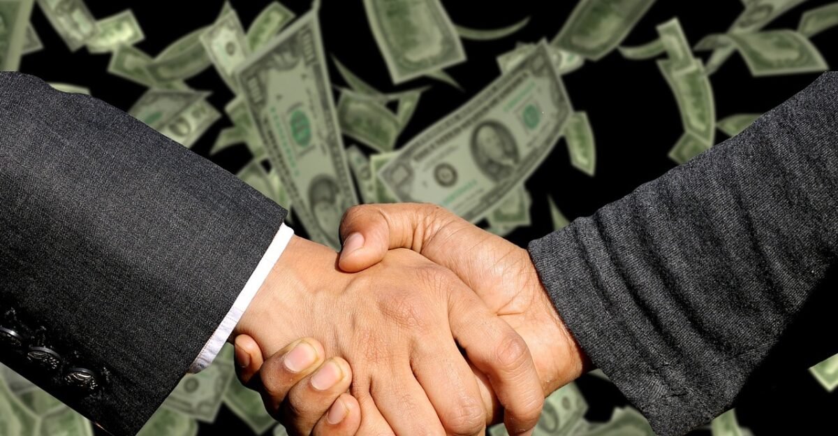 handshake agreement trade business profit sale commercial money contract concept gesture handshake trade money money money money money