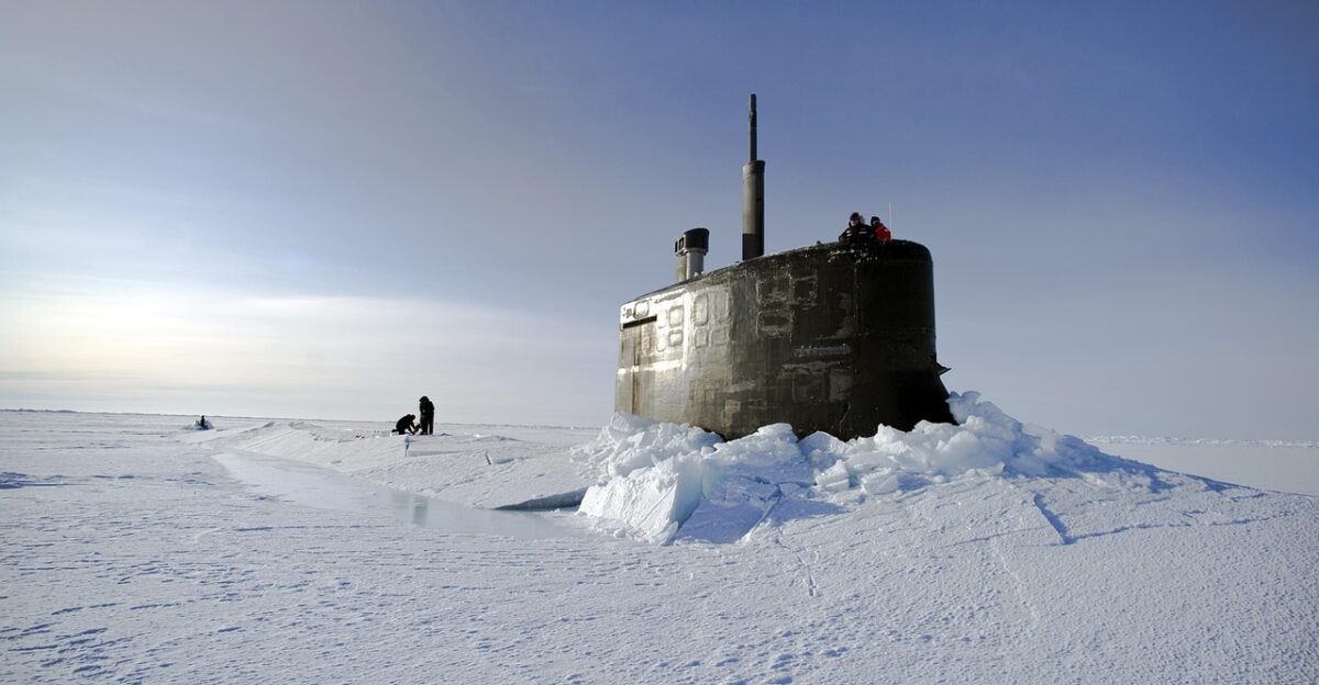 arctic ocean submarine us navy through the ice landscape winter snow ice frozen freezing cold sky nature sun light
