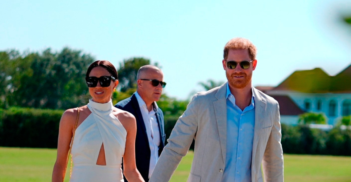 Prince Harry Meghan share celebratory kiss after charity polo