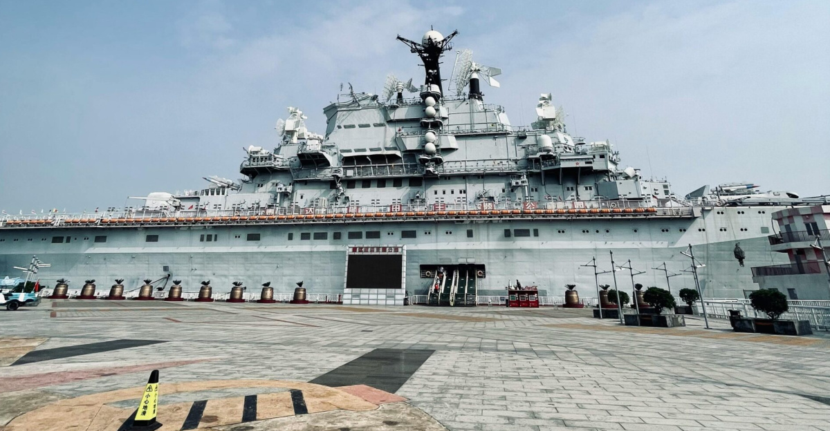 Moored battleship with clear sky in Bin Hai Xin Qu, Tianjin, China.
