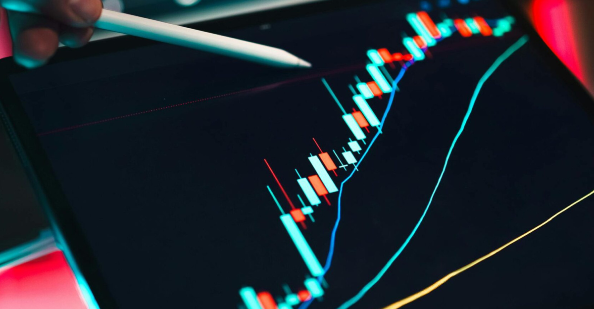 Close-up of cryptocurrency trading analysis on a digital tablet, highlighting market trends.