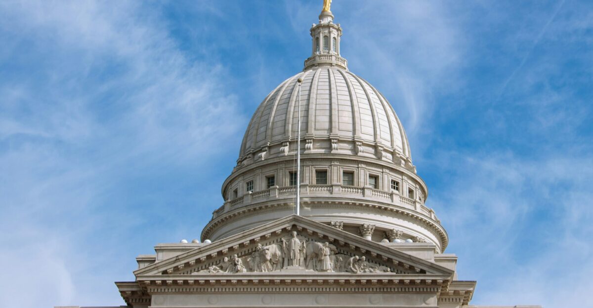 white concrete building under blue sky during daytime