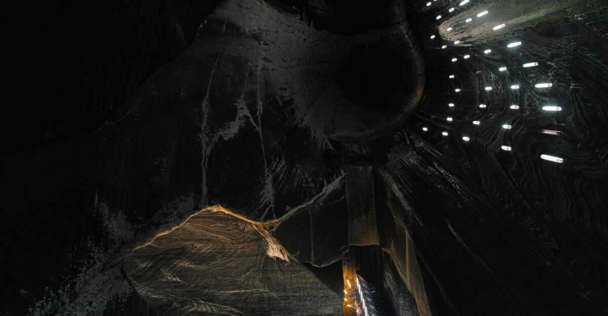 a large piece of art is lit up in the dark