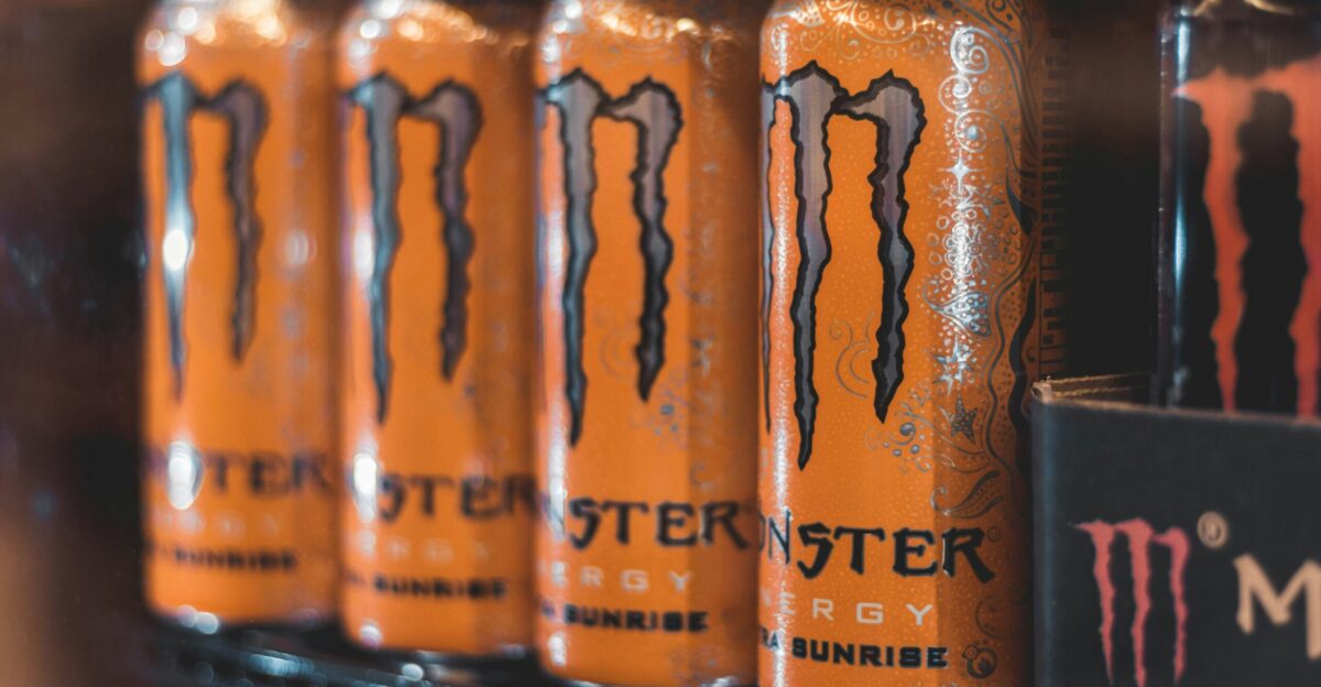 five Monster Energy cans