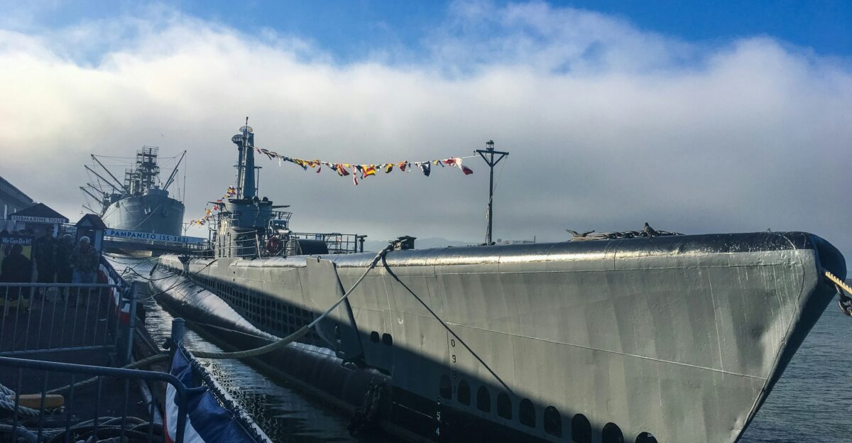 gray ship beside dock