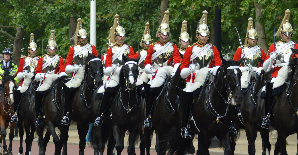 man riding horse photography