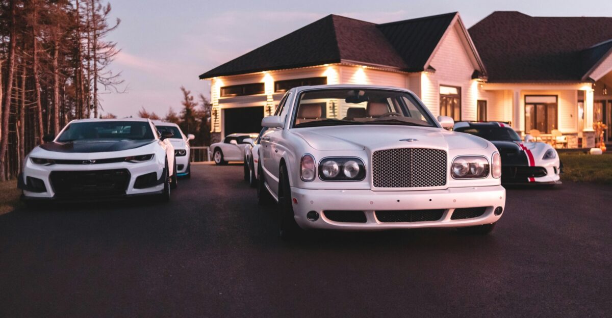 white car on paved road