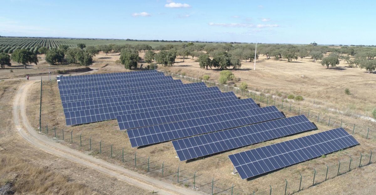 blue solar panel on gray concrete road during daytime