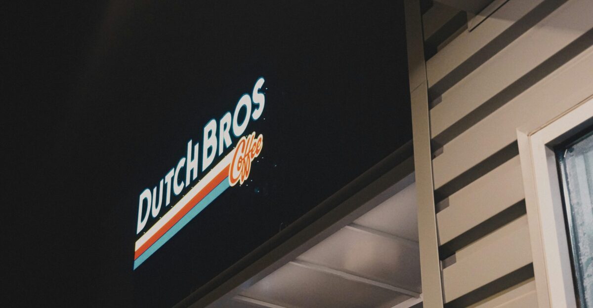 black and white UNKs neon sign