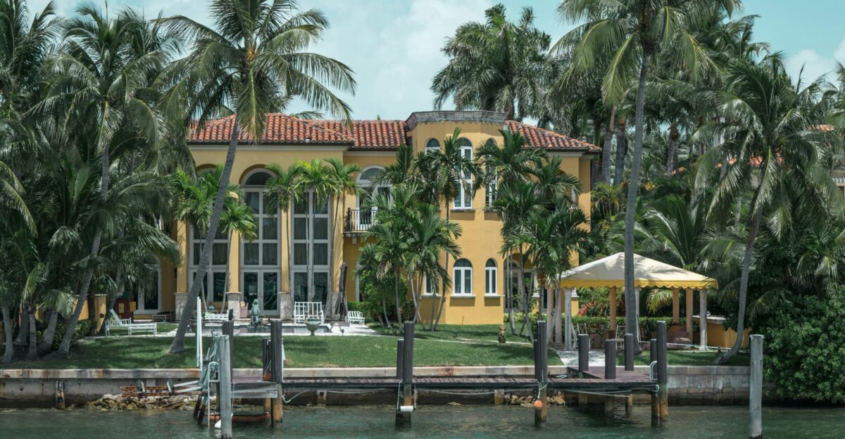 people walking on dock near building during daytime