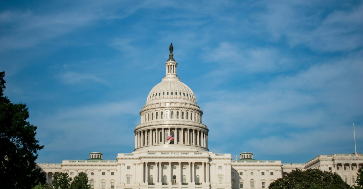 white concrete building under blue sky during daytime
