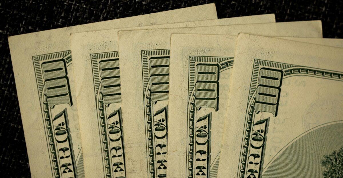 a close up of a bunch of money on a table