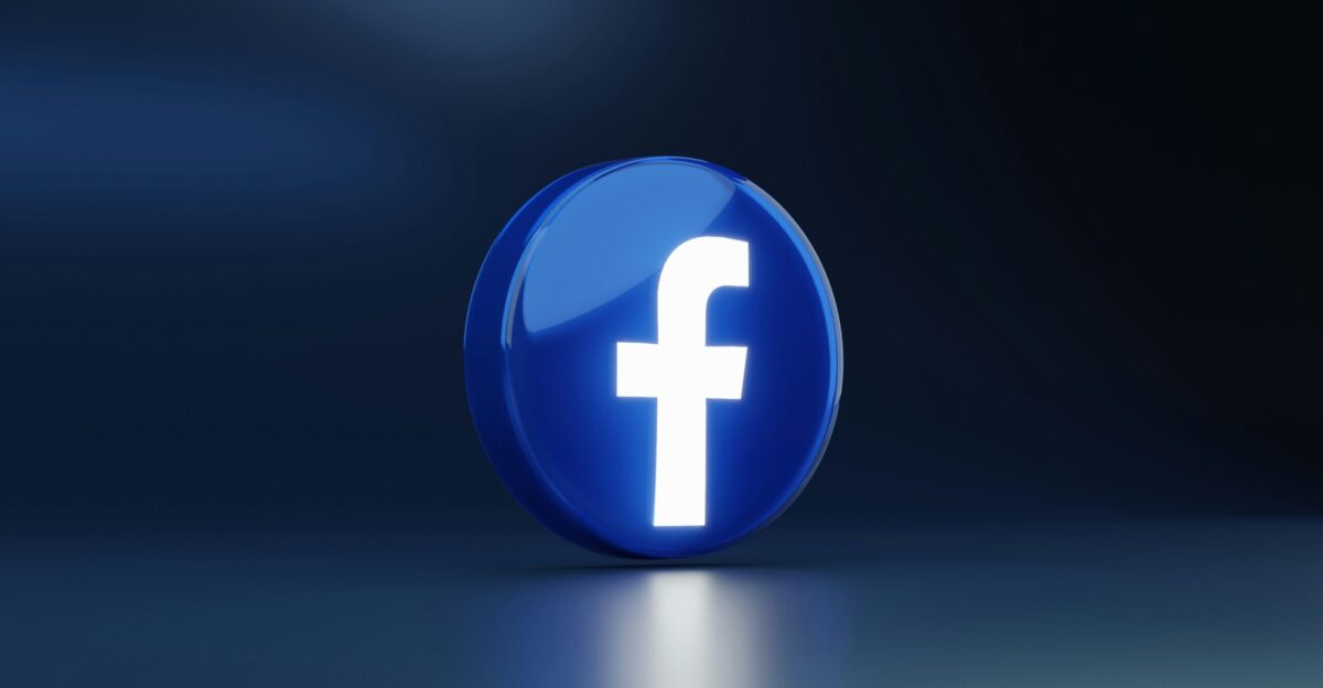 a blue logo with a white cross