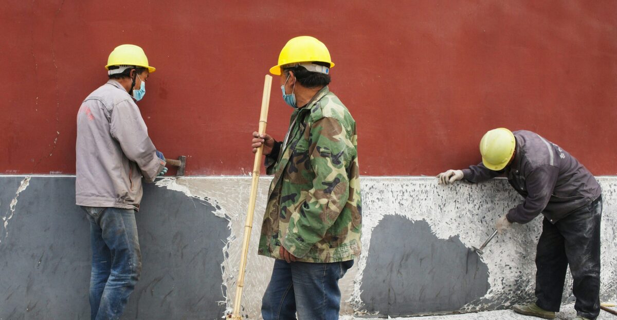 a group of men standing next to each other