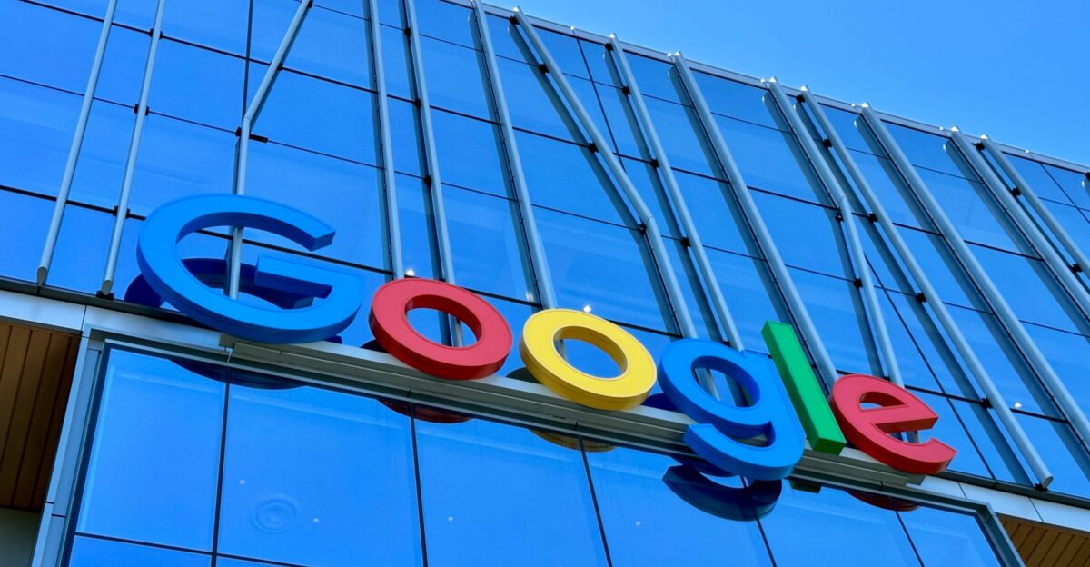 the google logo is displayed on the side of a building