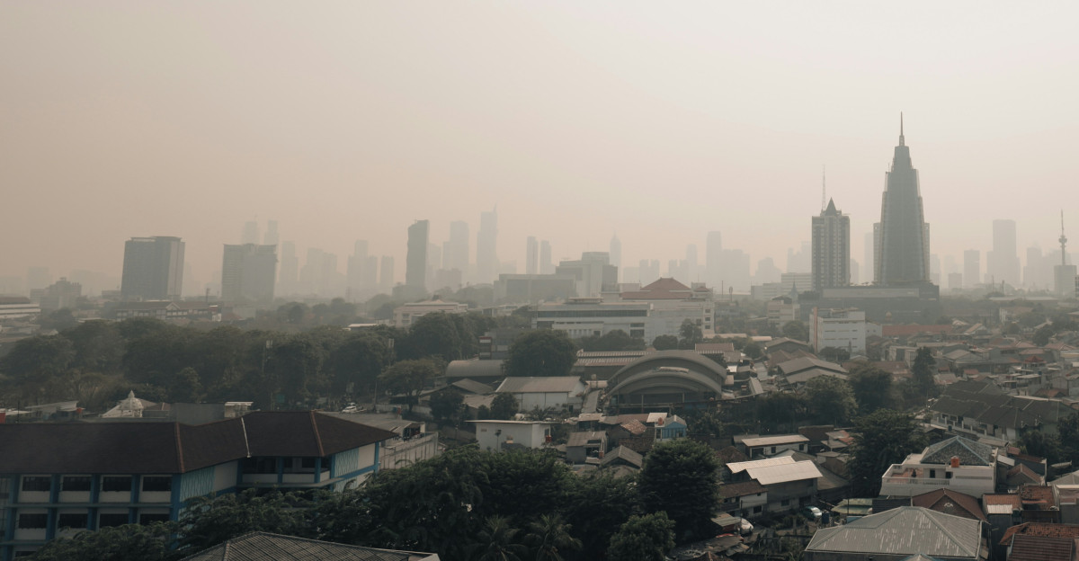 a view of a city with tall buildings
