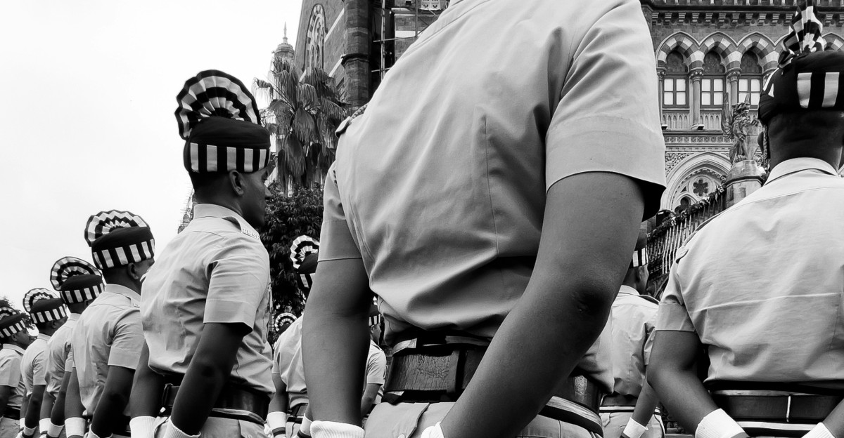 A black and white photo of a marching band