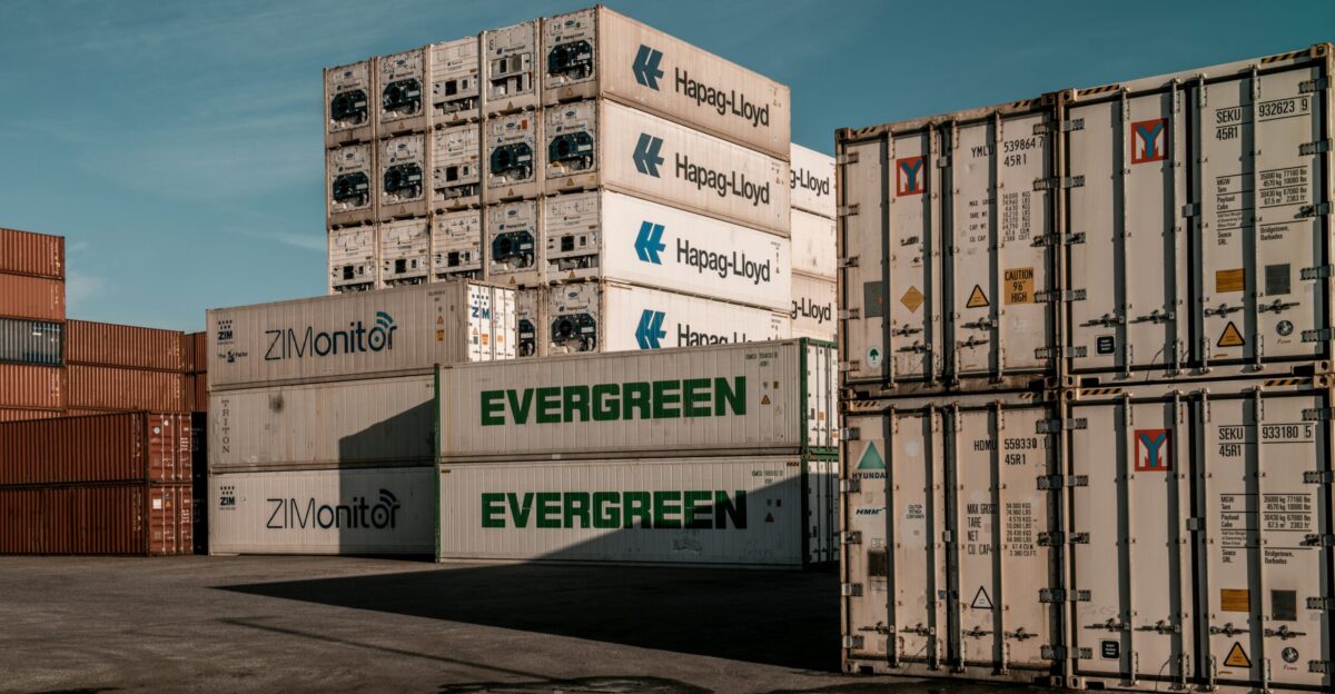 A bunch of containers stacked on top of each other