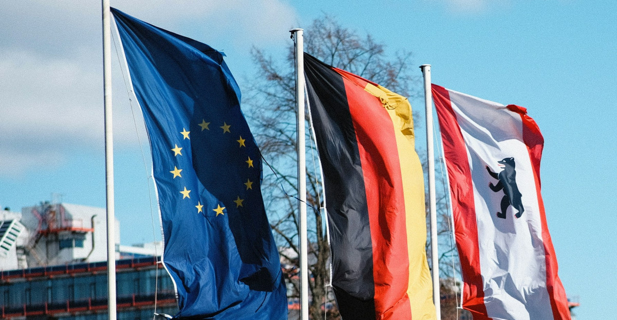 Flags of various countries are waving in the wind