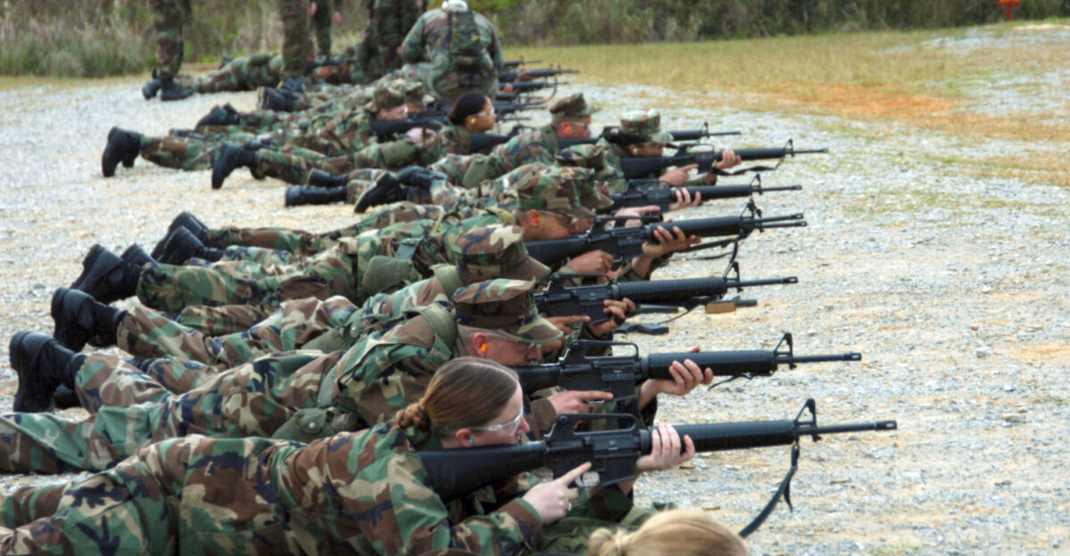 Okinawa Japan Jan 24 2006 - Seabees assigned to Naval Mobile Construction Battalion Four NMCB-4 conduct weapon qualifications with M-16 rifles at Camp Hansen Marine Base NMCB-4 is currently on a scheduled deployment on the island of Okinawa Japan U S Navy photo by Photographer s Mate 3rd Class Ronald Gutridge RELEASED