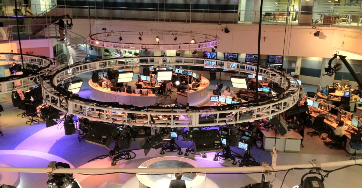 Photo from balcony overlooking main television studio from behind presenter s desk in the Doha headquarters