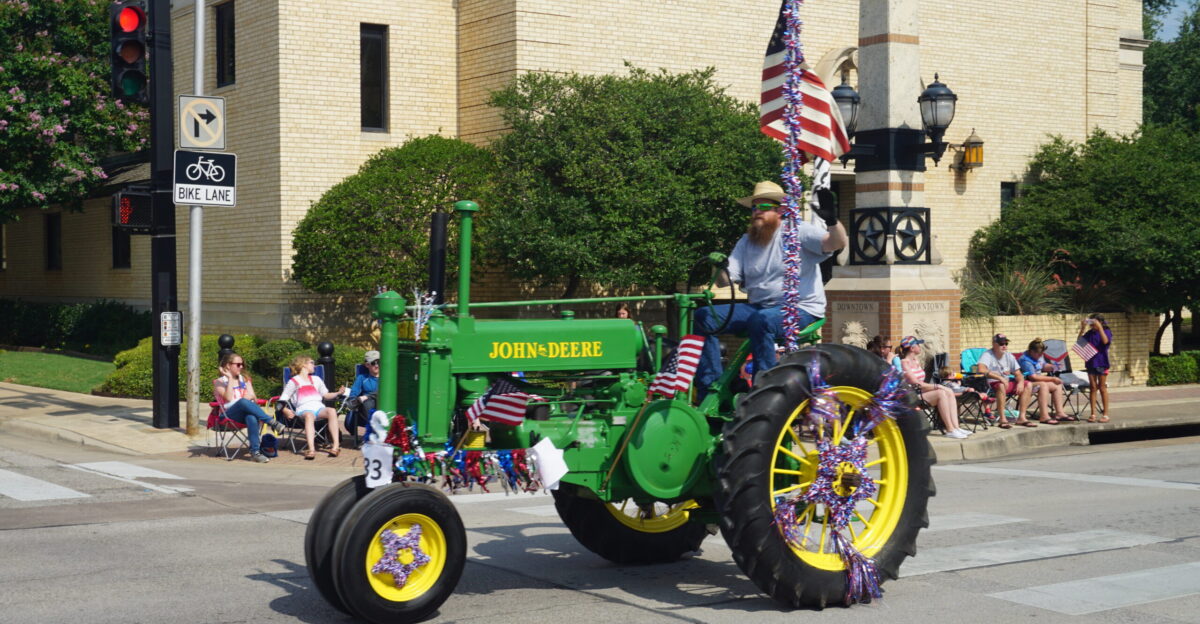 A John Deere tractor in the 2021 Arlington Independence Day Parade in Arlington Texas United States