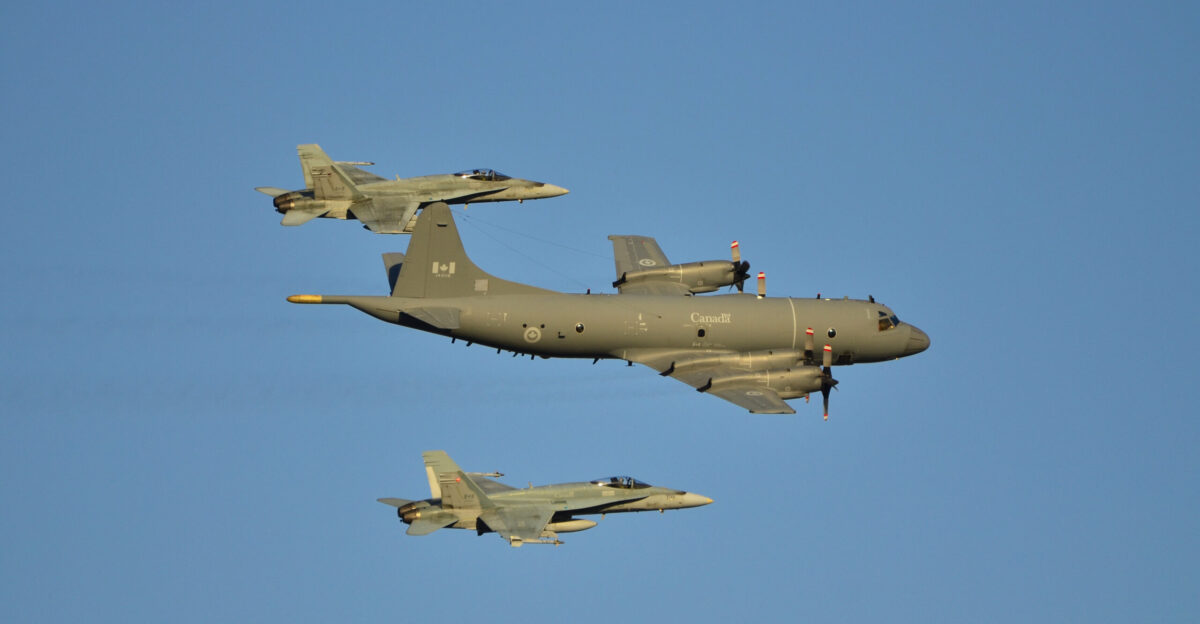 A CP-140 Aurora maritime patrol aircraft and two CF-18 fighter aircrafts of the Royal Canadian Air Force during a demonstration in Quebec City in 2012