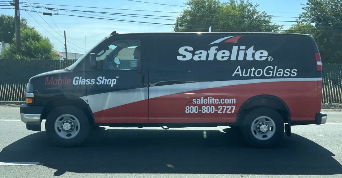 A Chevrolet Express Safelite AutoGlass van