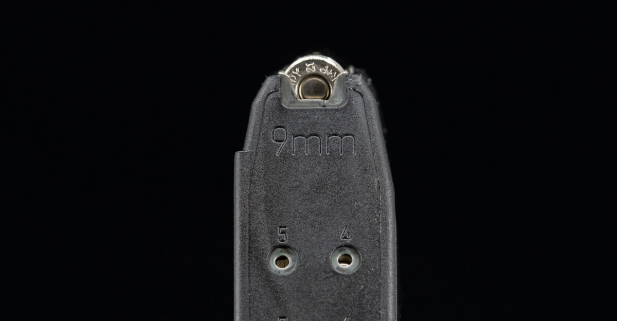 A Glock 9mm handgun magazine loaded with Hornady rounds