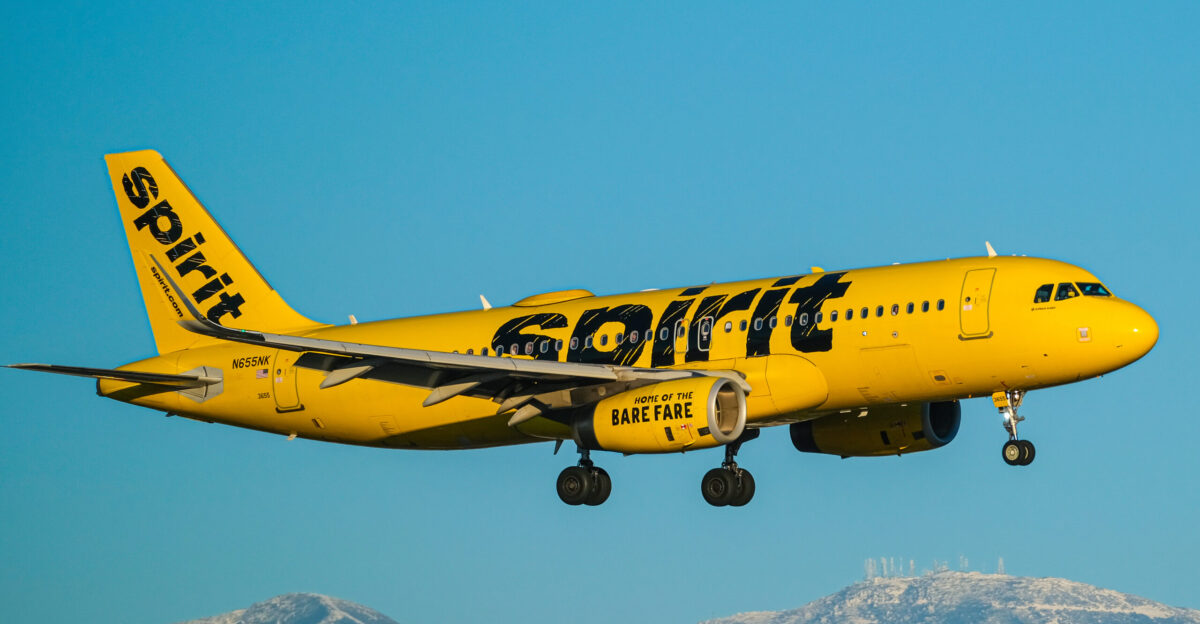 Ground to air photograph of a Spirit Airlines Airbus A320 landing at John Wayne Airport KSNA