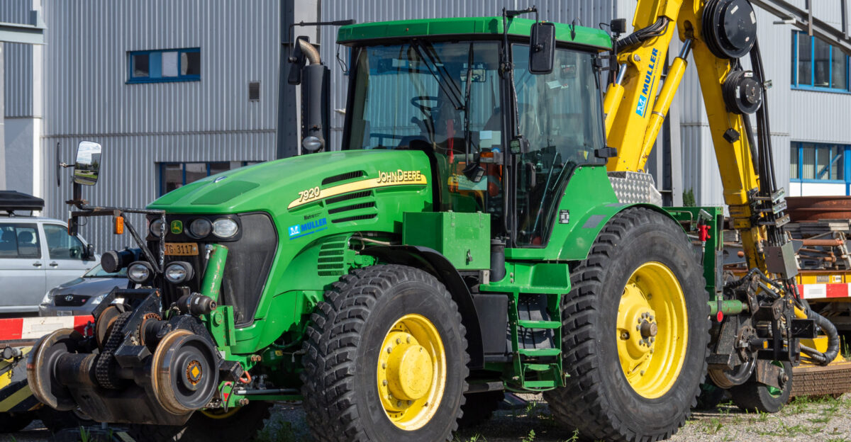 John Deere 7920 of a track construction company in Switzerland the tractor is equipped with special attachments
