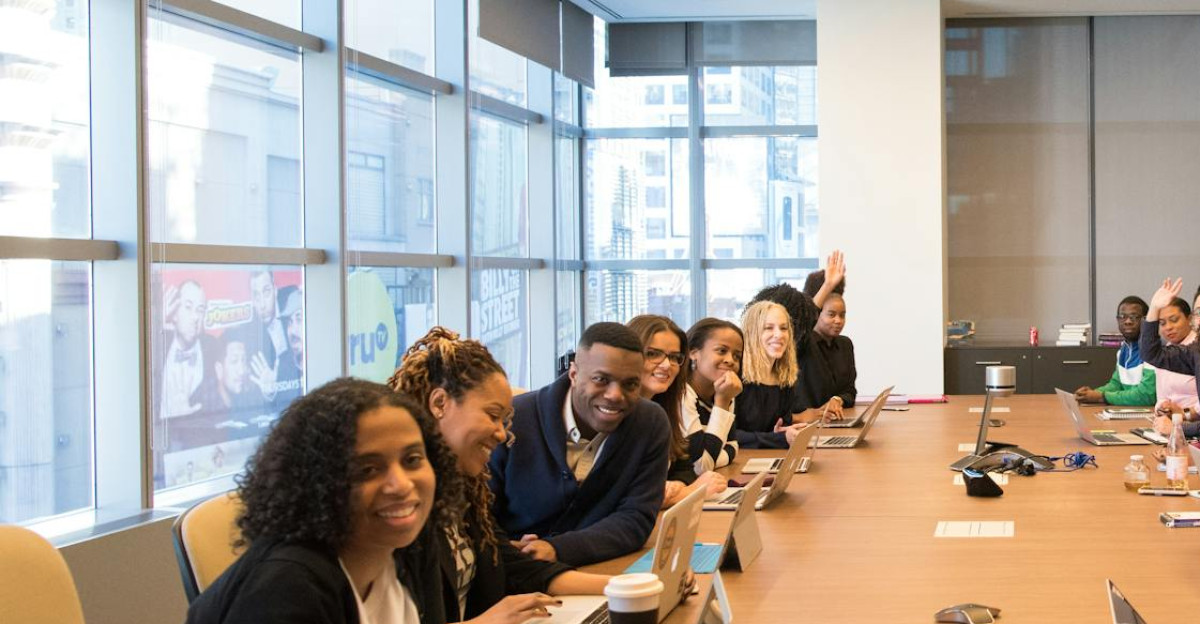A diverse group of professionals engaging in a productive meeting around a conference table